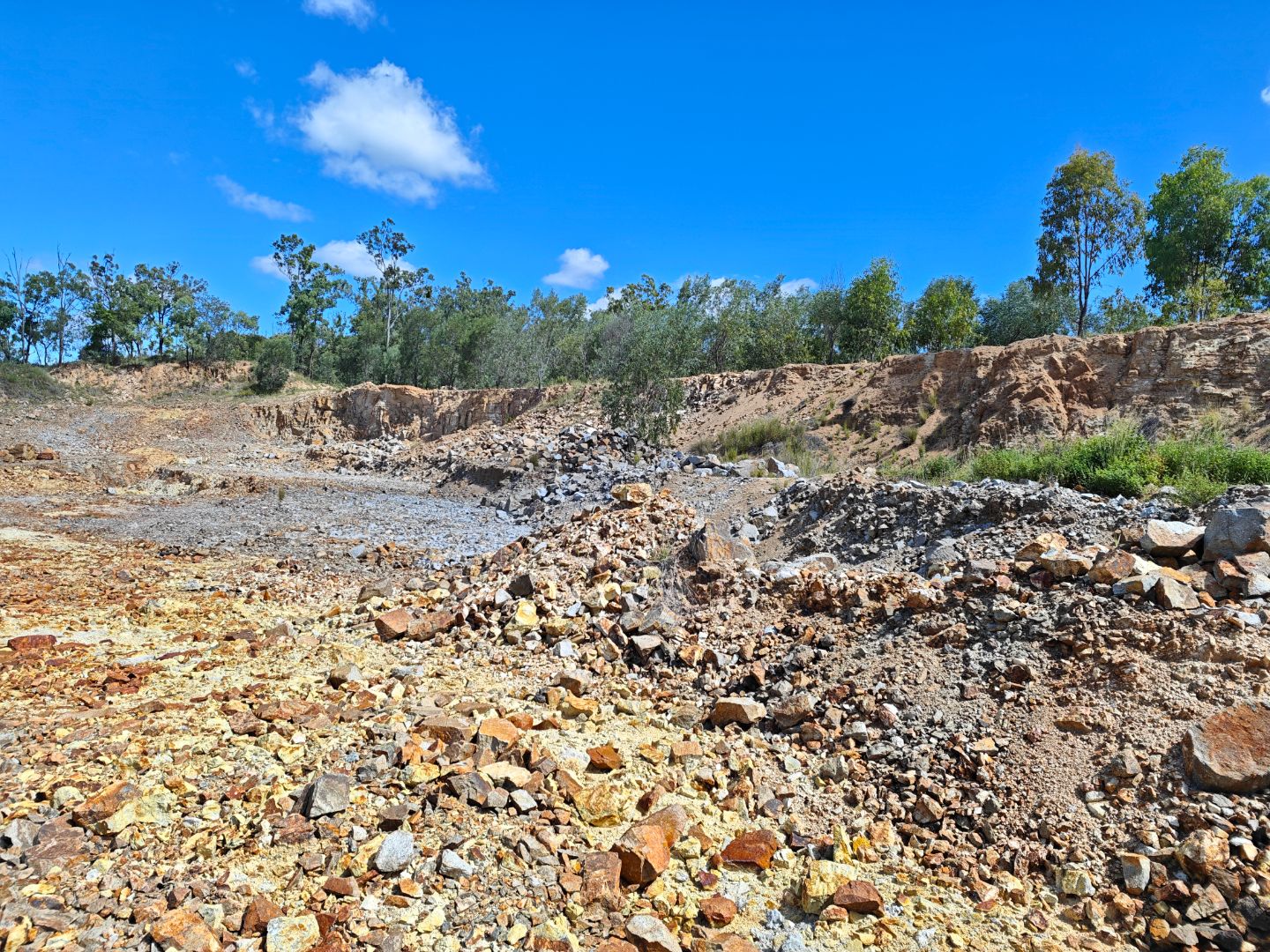 Open pit mining area with mineralised ore
